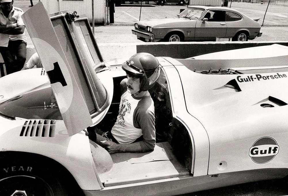 Mike Parris with Otis Chandler’s Porsche 917s at Riverside Dean’s Garage